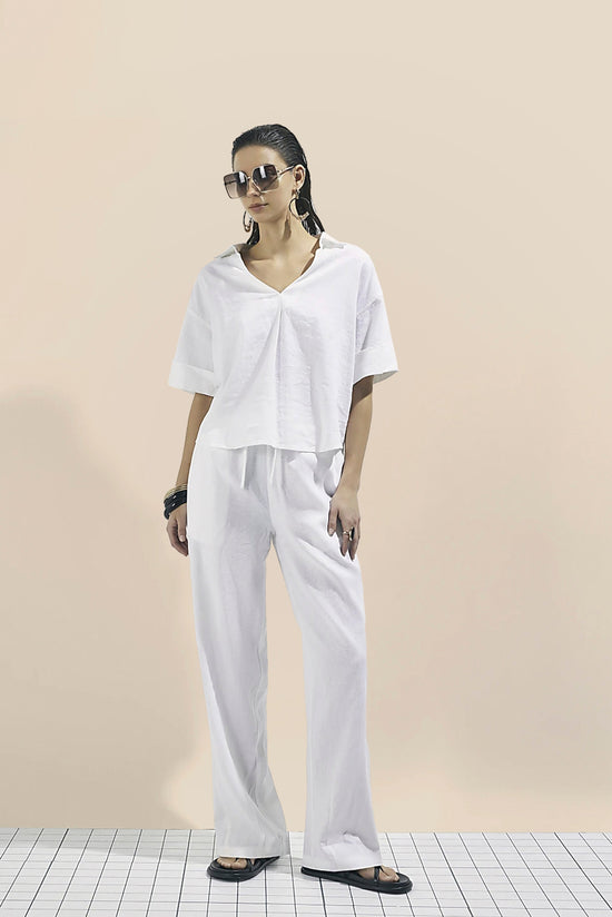 The Coastal Drawstring Trousers In White kevincollin.com